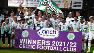 <p>Paradise found: Celtic celebrate after clinching the Cinch Premiership title after a 1-1 draw at Tannadice Park, Dundee.</p>