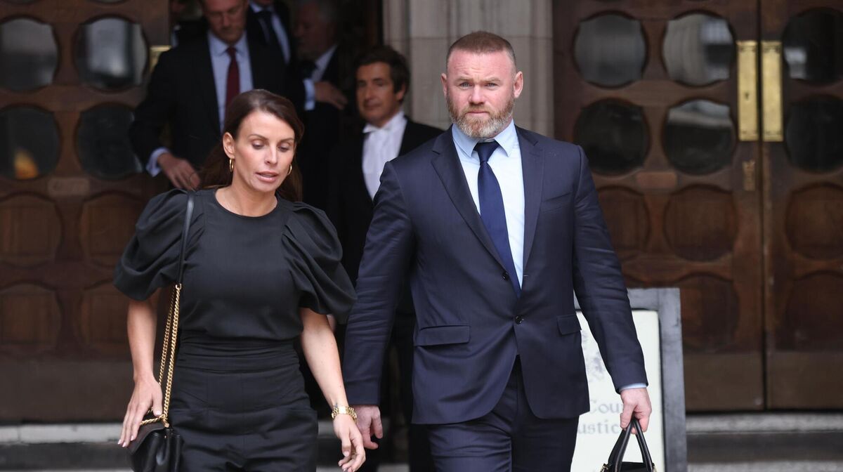 Coleen and Wayne Rooney leave the Royal Courts of Justice, London, during the libel battle between Rebekah Vardy and Ms Rooney. 	Picture: PA