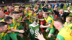 <p>GLEE: Rockmount captain Ken Hoey and players celebrate after defeating Bluebell United in the FAI Centenary Intermediate cup final at Turner's Cross. </p>
