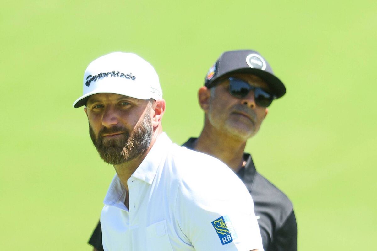 TWO HEADS: Dustin Johnson and coach Claude Harmon III