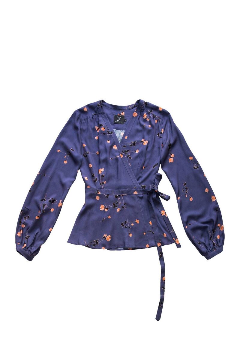 A timeless floral blouse, €138, AFORE AFTER.