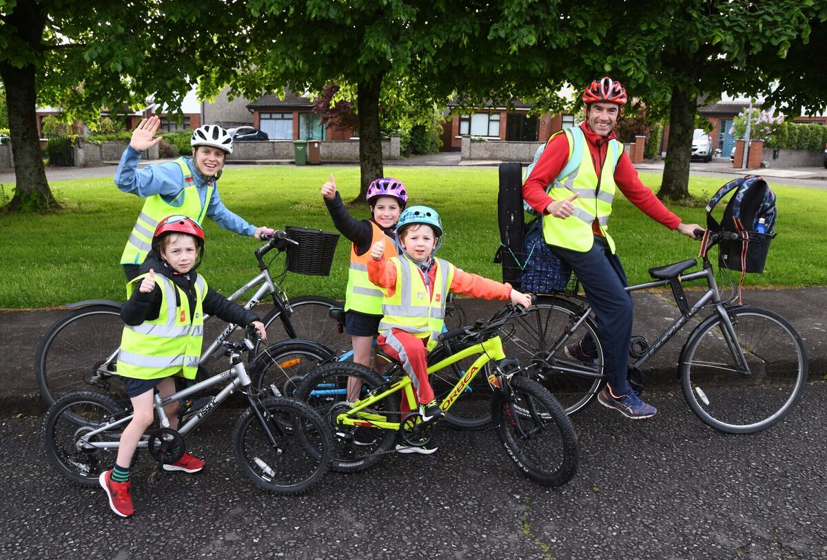 The O'Keeffe family, Brian, Claire, Helena, Pearse and Gearóid, who took part in Bus na Rothar, Cycle Bus to School, from Rossbrook, Model Farm Road, Cork, and areas along the route to Gaelscoil Uí Riada, Wilton, during National Bike Week. Pic: Denis Minihane.