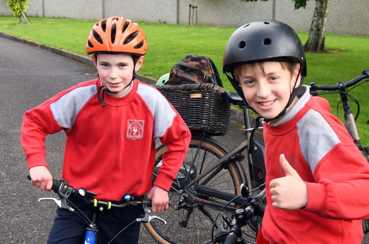 Cathal (left) and Finn took part in Bus na Rothar, Cycle Bus to School, from Rossbrook, Model Farm Road, Cork, and areas along the route to Gaelscoil Uí Riada, Wilton, during National Bike Week. Pic: Denis Minihane.