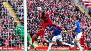 <p>Liverpool's Divock Origi scores their side's second goal of the game during the Premier League match at Anfield, Liverpool. Photo credit: Peter Byrne/PA Wire.</p>