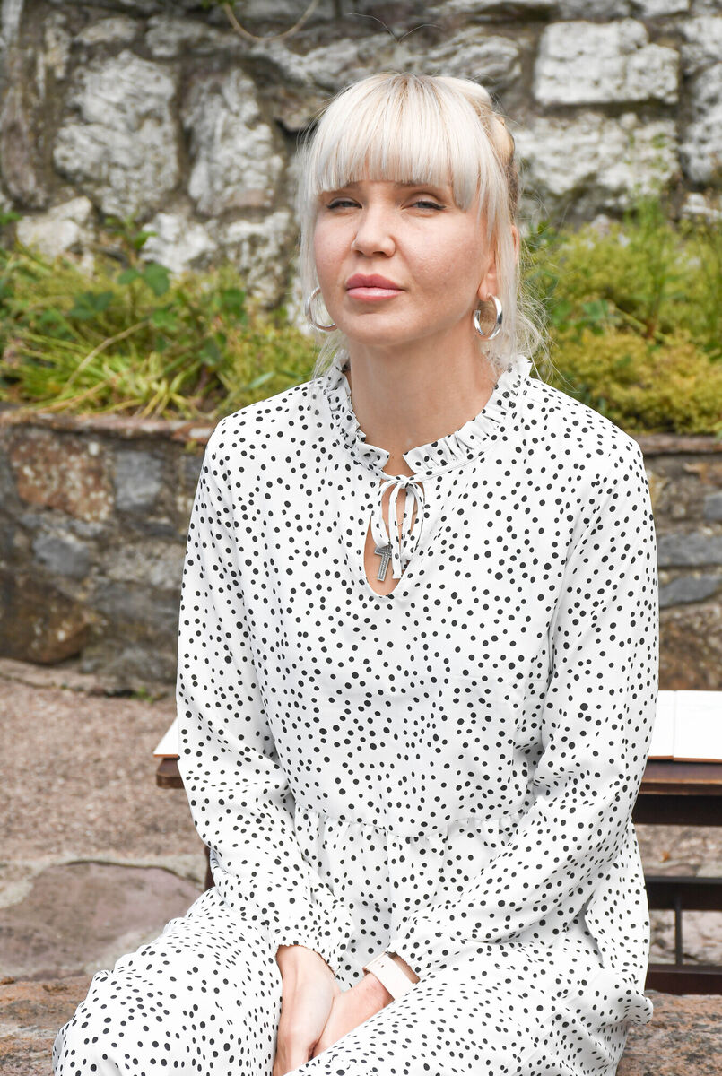 Svetlana Sidenko from Ukraine pictured in the garden of her temporary accommodation in Ballyporeen. Picture: Howard Crowdy