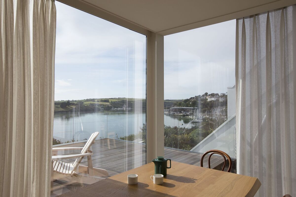 Lucy Jones’ coastal house design in Kinsale, Co. Cork, maximises access to the view and links the house to the outside, while floor to ceiling windows allow the light to flood in. Lucy Jones’ coastal house design in Kinsale, Co. Cork, maximises access to the view and links the house to the outside, while floor to ceiling windows allow the light to flood in.