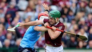<p>TANGLE: Dublin's Paddy Smyth tries to halt the progress of Galway's Brian Concannon.</p>