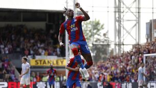 <p>Crystal Palace’s Wilfried Zaha celebrates scoring against Manchester United (Steven Paston/PA)</p>