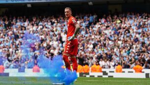 <p>Aston Villa goalkeeper Robin Olsen stands dejected after conceding a third goal, scored by Manchester City's Ilkay Gundogan during the Premier League match at The Etihad Stadium, Manchester. Picture date: Sunday May 22, 2022.</p>