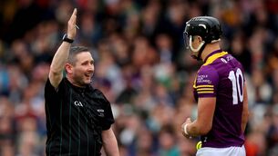 <p>Referee Fergal Horgan with Jack O’Connor of Wexford in Saturday's Leinster SHC R5 tie against Kilkenny. ©INPHO/Ryan Byrne</p>