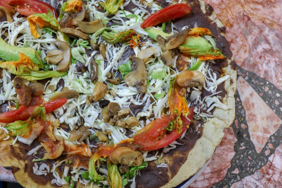 Tlayuda: a thin BBQ tortilla that's served like a pizza Tlayuda: a thin BBQ tortilla that's served like a pizza