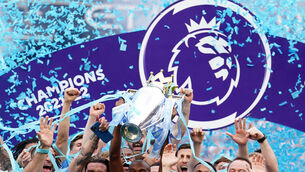 <p>Manchester City's Fernandinho lifts the Premier League trophy following the the Premier League match at The Etihad Stadium, Manchester. Picture date: Sunday May 22, 2022.</p>