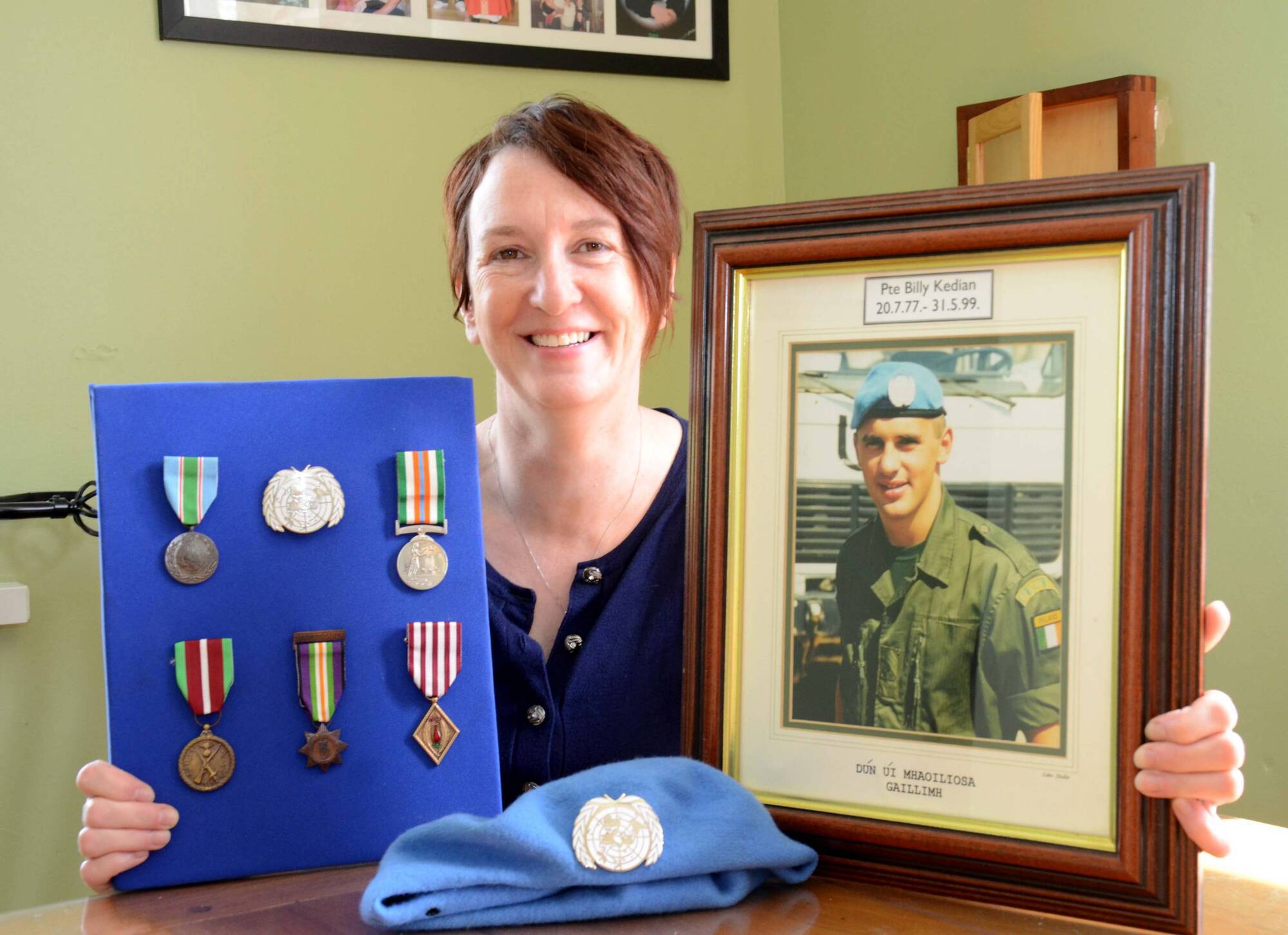 Ann Lenehan, at her home near Ballyhaunis in Mayo, with a picture and the medals and beret of her late brother Billy Kedian, who was killed in the Lebanon.	Picture: Paul Mealey
            