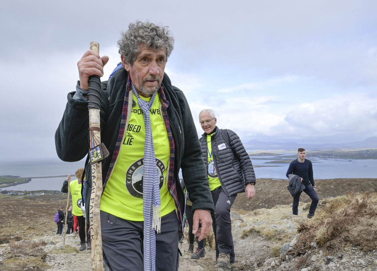 Charlie Bird climbing Croagh Patrick to raise funds for two charities which are very close to his heart – Irish Motor Neurone Disease (IMNDA) and Pieta. Pic: Michael Mc Laughlin/Photo: RollingNews.ie