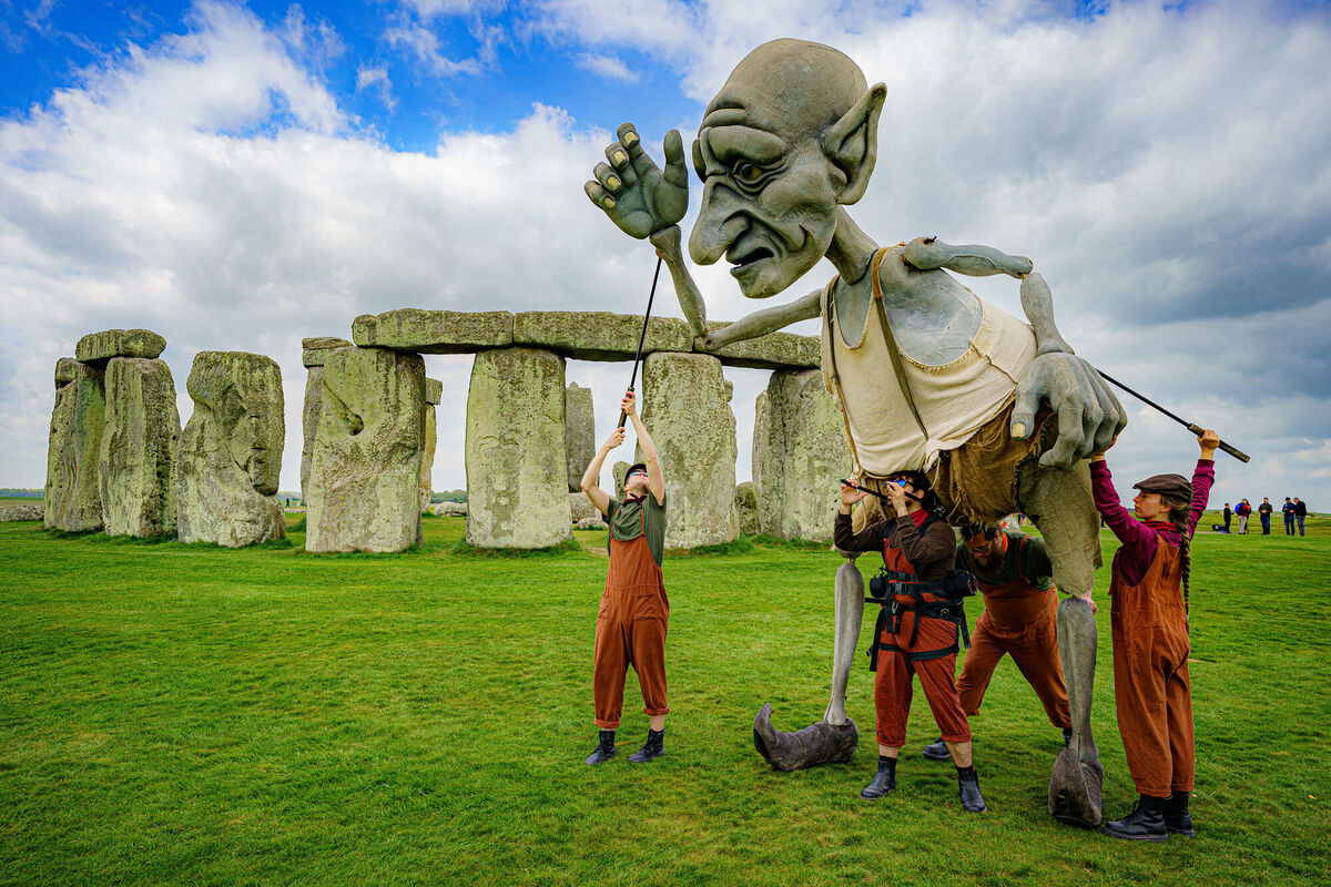 A giant puppet, controlled by four people, called Gnomus, the Caretaker of the Earth, performs at Stonehenge, near Amesbury, Wiltshire. Picture: Ben Birchall/PA Wire