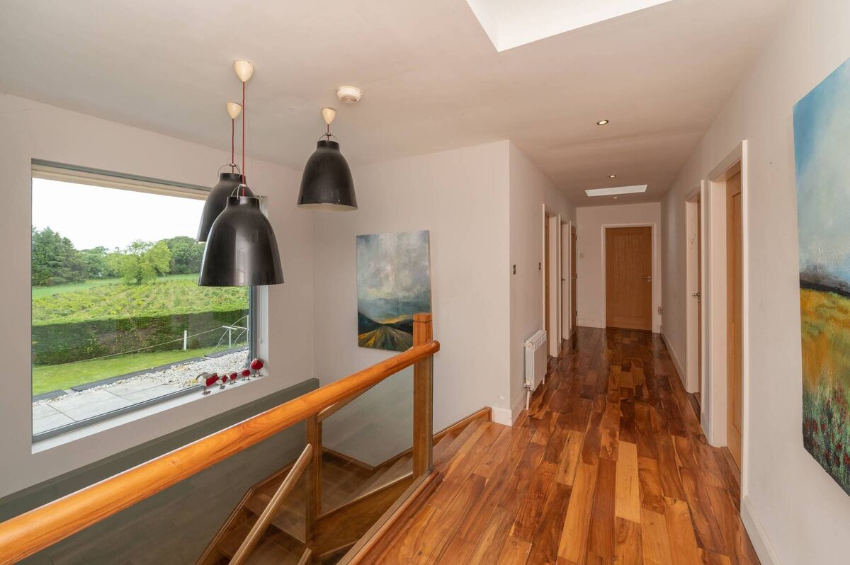 Picture window over bespoke staircase