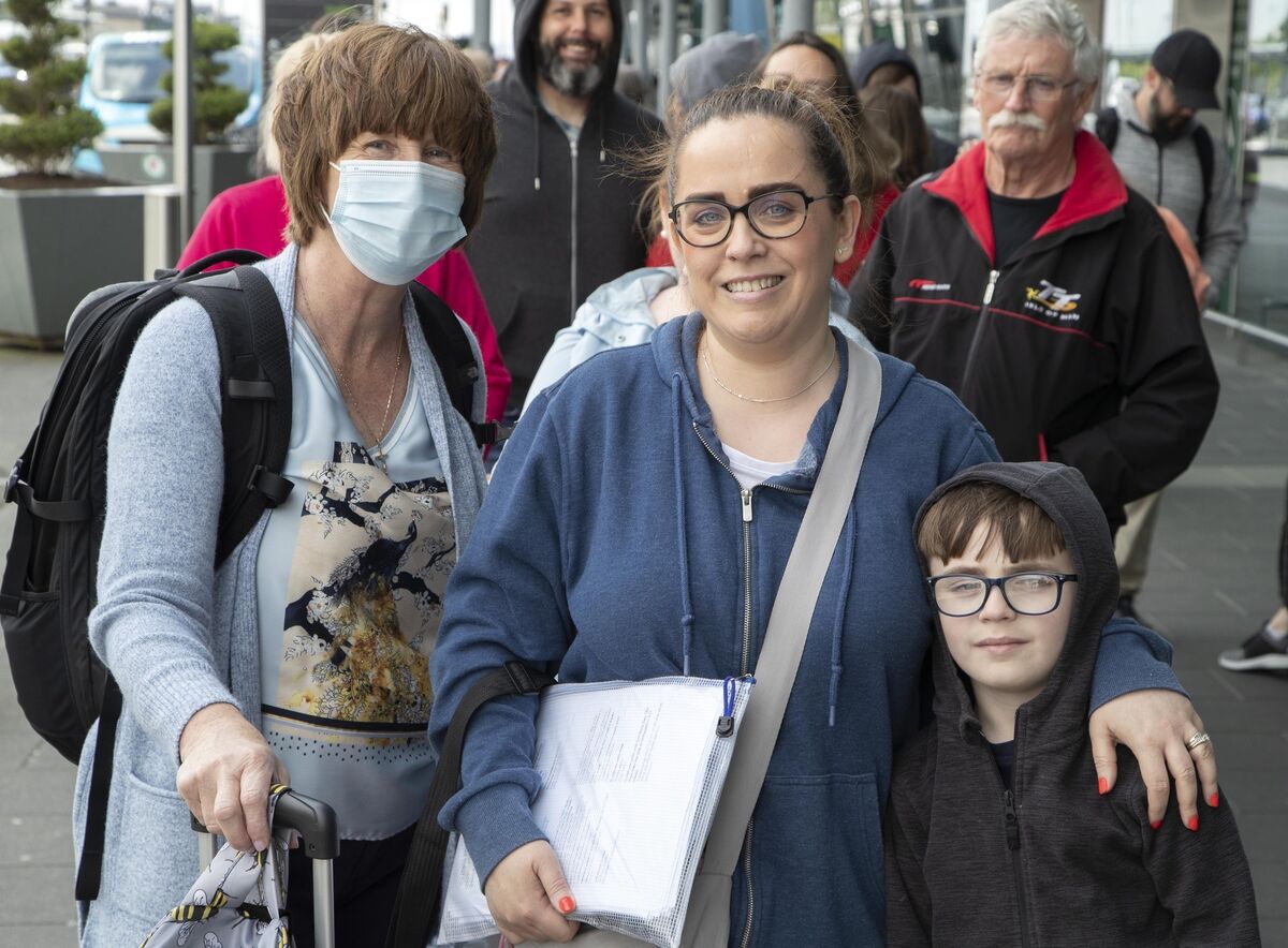 Anne, Ciara, and Luke McCarthy, were travelling to Florida yesterday when they got stuck in the hours-long queues at Dublin Airport.