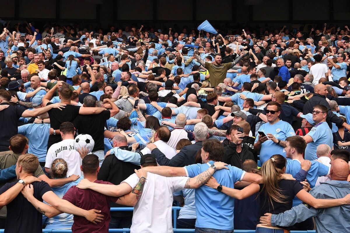 Manchester City fans celebrate winning the 2022 Premier League title against Aston Villa at Etihad Stadium. Picture: Stu Forster