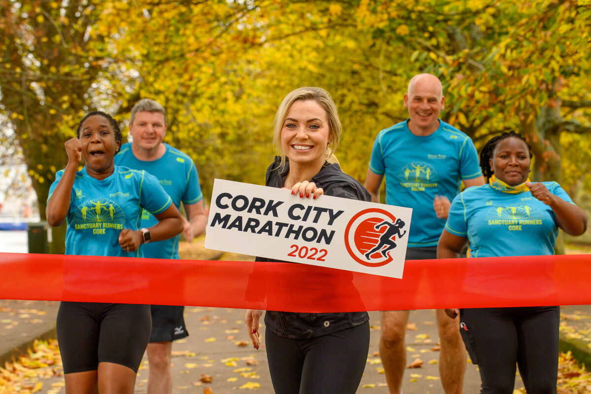 Sanctuary Runners Yolanda Mhene, Graham Clifford, John Riordan and Noma Themba Macala join former Cork camogie star Anna Geary on the banks of the River Lee launching the 2022 Cork City Marathon. Sanctuary Runners Yolanda Mhene, Graham Clifford, John Riordan and Noma Themba Macala join former Cork camogie star Anna Geary on the banks of the River Lee launching the 2022 Cork City Marathon.