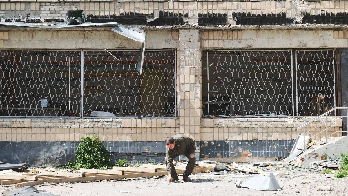 Shrapnel is collected from a playground outside a children's hospital in Ukraine. Picture: WHO Newsroom