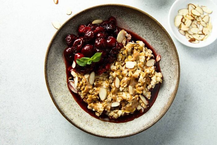 Cherry compote with treacle granola