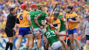 <p>FRIENDLY FIRE: Clare and Limerick players jostle each other during the Munster Championship Round 4 match in Ennis. Pic: John Sheridan/Sportsfile</p>