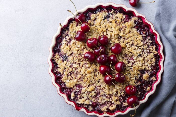 Apple and cherry crumble pie