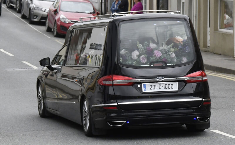 The hearse with the remains of Gillian Daly going through Millstreet following Requiem Mass in St Patrick's Church. The hearse with the remains of Gillian Daly going through Millstreet following Requiem Mass in St Patrick's Church.