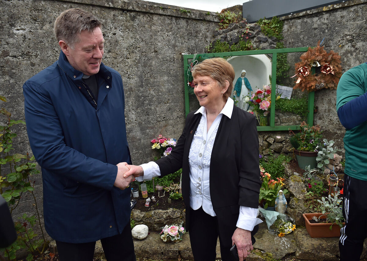 Archbishop of Tuam Francis Duffy talks to local historian Catherine Corless at the Tuam Mother and Baby Home site in what is the Archbishop's first visit since he was installed. Picture: Ray Ryan