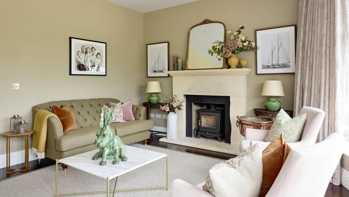 Ruth's walls painted in Setting Stone and ceiling in Turtledove Grey, both by Dulux Heritage