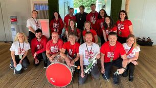 <p>Cork City Samba Band with comedian John Bishop</p>