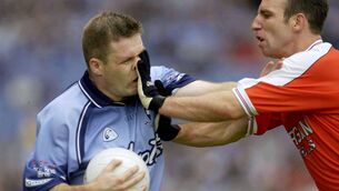 <p>Facing up to the truth: Dessie Farrell, Dublin, in action against Armagh's Enda McNulty during a Bank of Ireland Senior Football Championship qualifier in 2003. Pic: Ray McManus / SPORTSFILE</p>