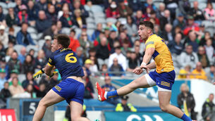 <p>Clare's Jamie Malone kicks the winning point for Clare. Mandatory Credit ©INPHO/Bryan Keane</p>