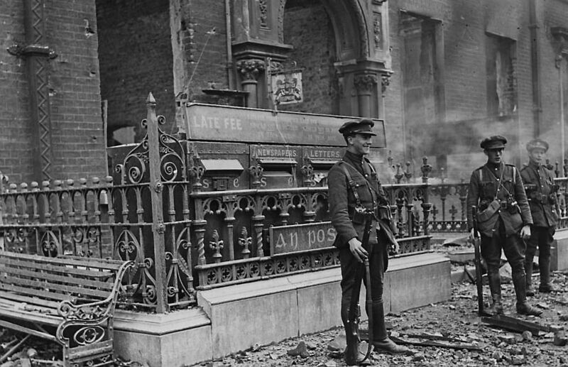 Irish Free State troops on guard outside a post office in Dublin in July 1922. 	Picture: Topical Press Agency/Getty
                    