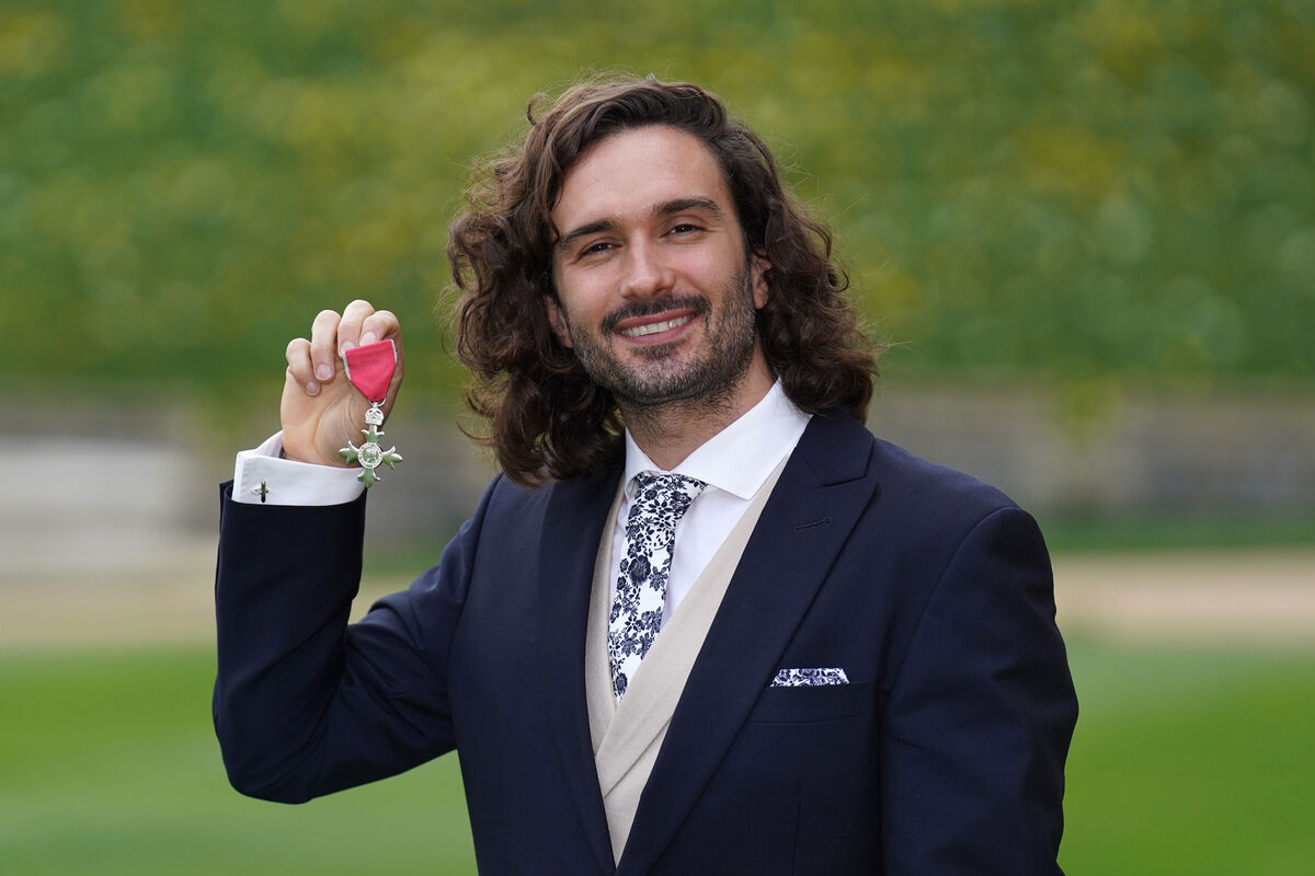 Joe Wicks after receiving his MBE medal from the Prince of Wales during an investiture ceremony at Windsor Castle. 