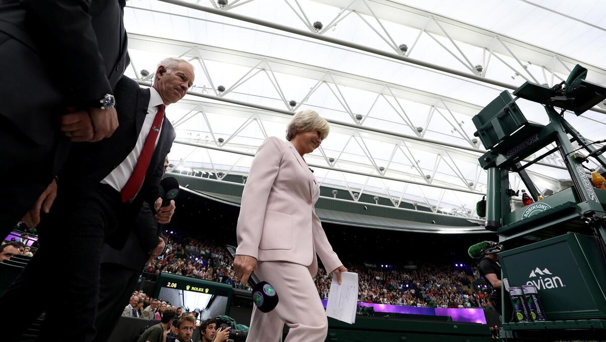 Still talking the talk: John McEnroe and the BBC's Sue Barker on No.1 court at The All England Lawn Tennis Club, London.
