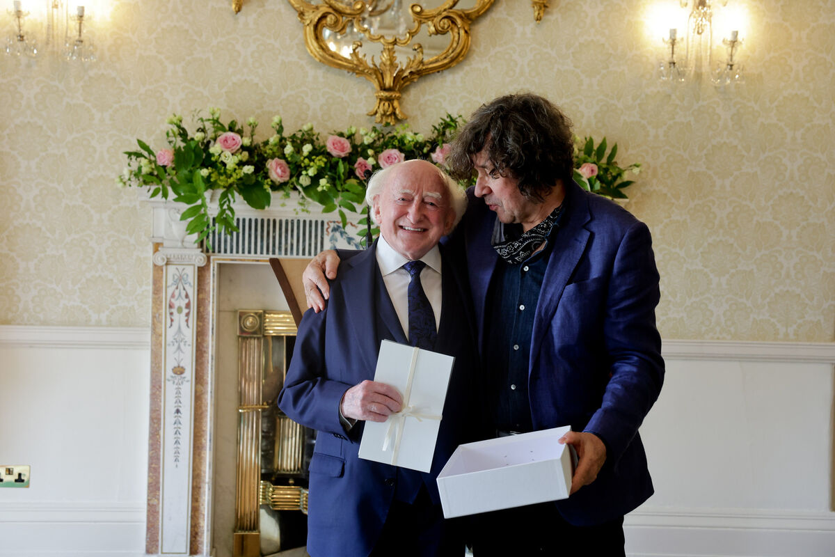President Michael D Higgins receiving the Tundish Award from actor Stephen Rae at a ceremony at Áras an Uachtaráin on Thursday. Picture:  Maxwell's