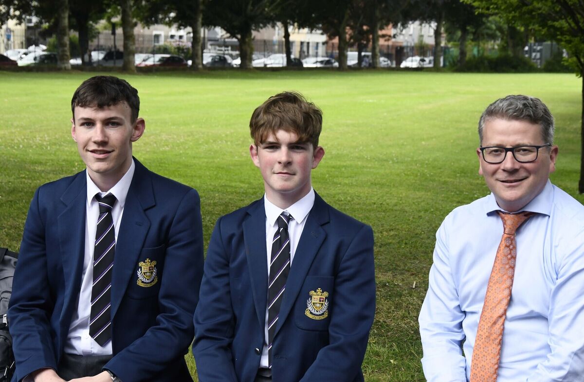 Stephen O'Mahony and Rocco Barry with principal David Barry after the German paper at Presentation Brothers College.
