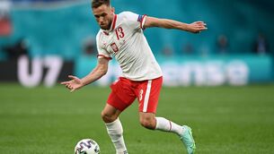 <p>Poland's defender Maciej Rybus controls the ball during the UEFA EURO 2020 Group E football match between Poland and Slovakia at the Saint Petersburg Stadium in Saint Petersburg on June 14, 2021. (Photo by KIRILL KUDRYAVTSEV/POOL/AFP via Getty Images)</p>