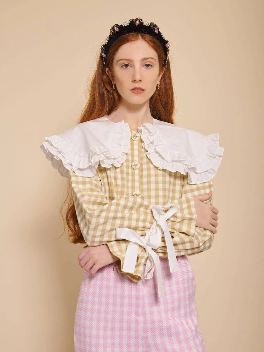 ‘Honey’ gingham blouse, €85; ‘Buzz’ gingham tweed trousers, €98, Sister Jane