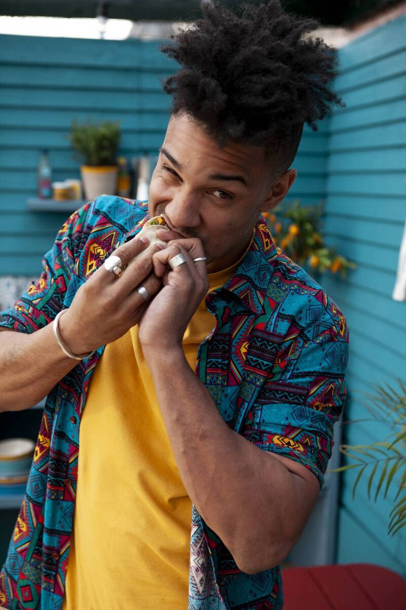 Nico Reynolds digs into a taco