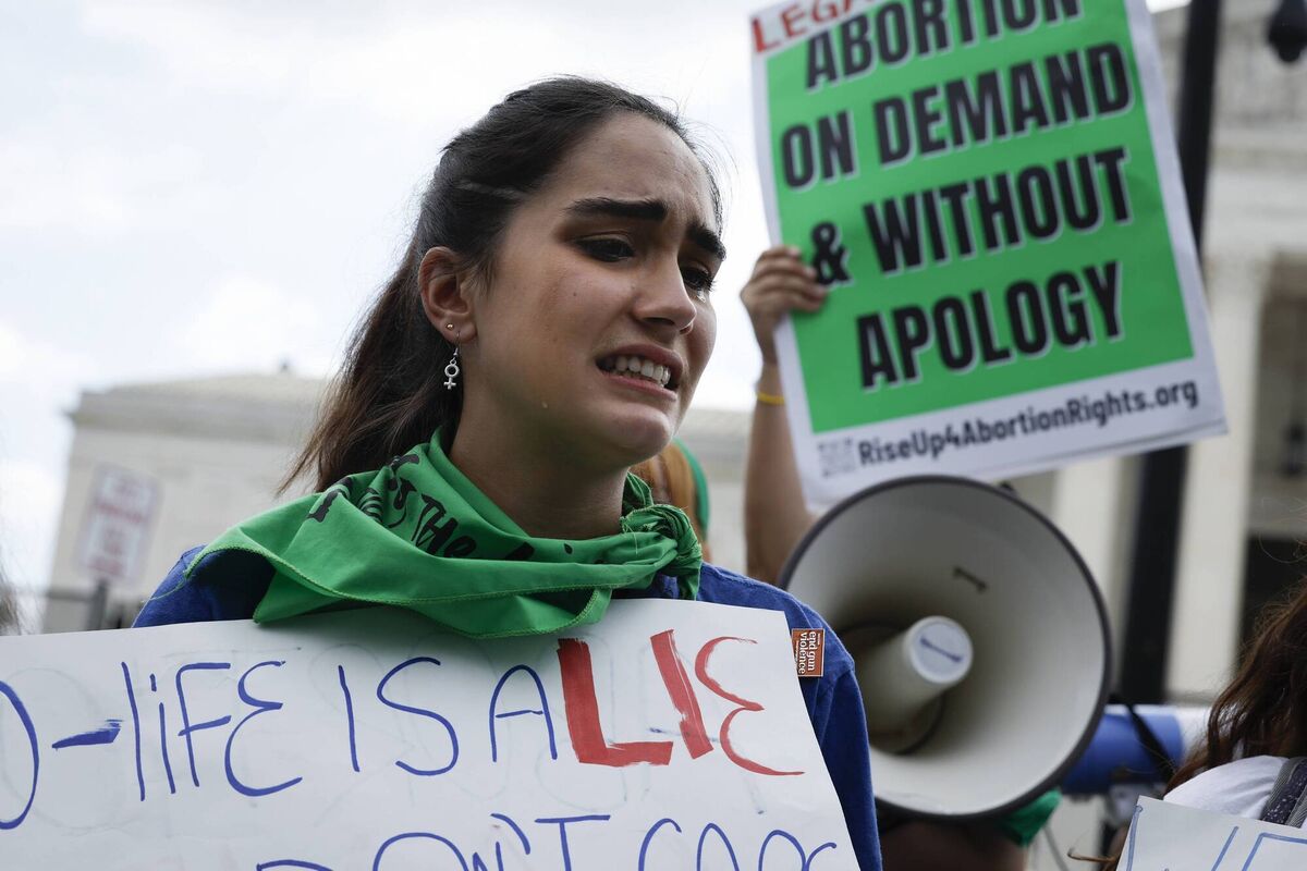 Abortion rights activist Carrie McDonald reacts to the ruling in front of the US Supreme Court today. The ruling is expected to lead to abortion rights bans in roughly half of the states in America. Photo: Anna Moneymaker/Getty Images