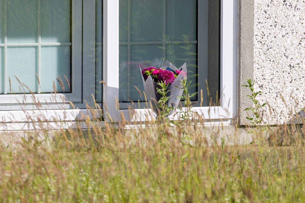 A floral tribute at the house in Cloneen. A floral tribute at the house in Cloneen.