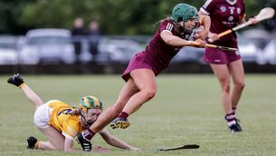 <p>SLIPPING AWAY: Glen Dimplex Senior All-Ireland Championship, Dunloy, Antrim 25/6/2022 Antrim vs Galway Galway's Heather Cooney with Antrim's Aine Magill. Pic: INPHO/John McVitty</p>