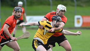 <p>Carrigdhoun's Mark Hitchmough is tackled by Duhallow's Eoin Sheahan during the Cork county divisions/colleges semi final at Coachford. Picture; Eddie O'Hare</p>