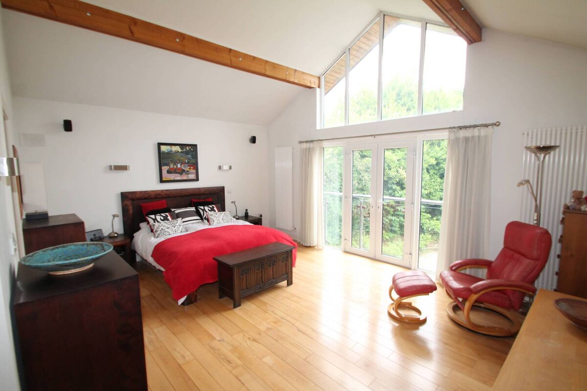 Bedroom suite with vaulted ceiling Bedroom suite with vaulted ceiling