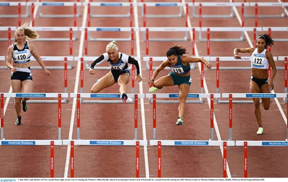 Jade Barber of USA, second from right, on her way to winning the Women's 100m Hurdles ahead of second place Sarah Lavin of Emerald AC, second from left, during the 2022 Morton Games at Morton Stadium in Santry, Dublin. Photo by David Fitzgerald/Sportsfile