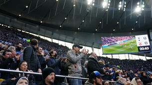 Tottenham fans in the safe standing area during last season’s FA Cup tie against Morecambe (John Walton/PA)