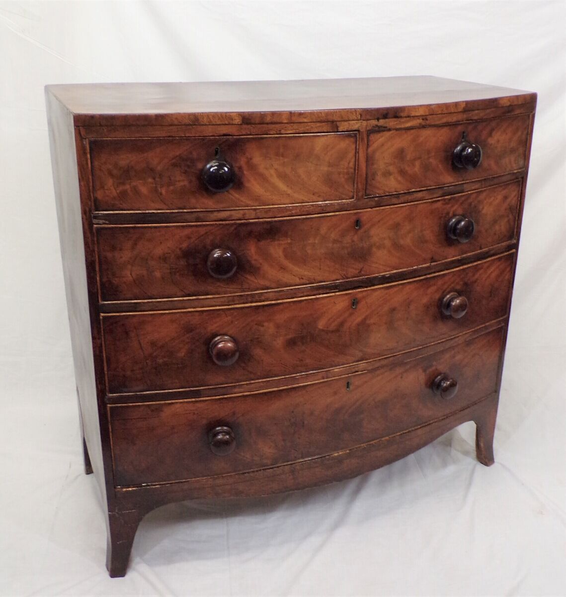 A bowfronted chest of drawers at Woodwards. A bowfronted chest of drawers at Woodwards.