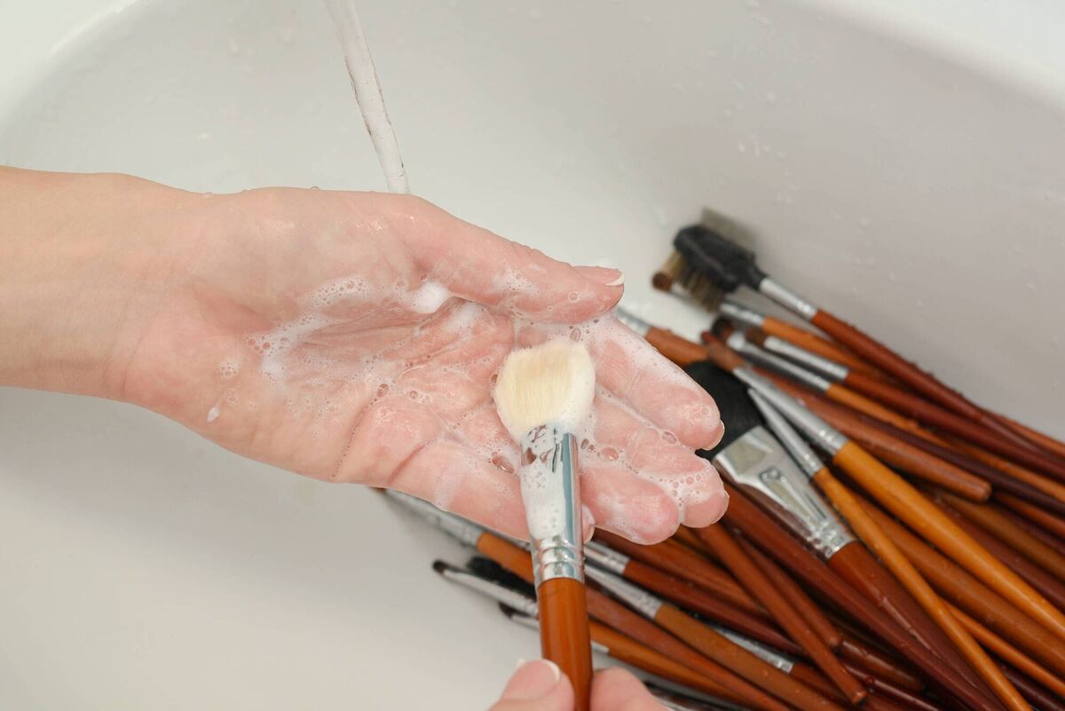 Washing your makeup brushes regularly can prevent pores from getting clogged with bacteria.